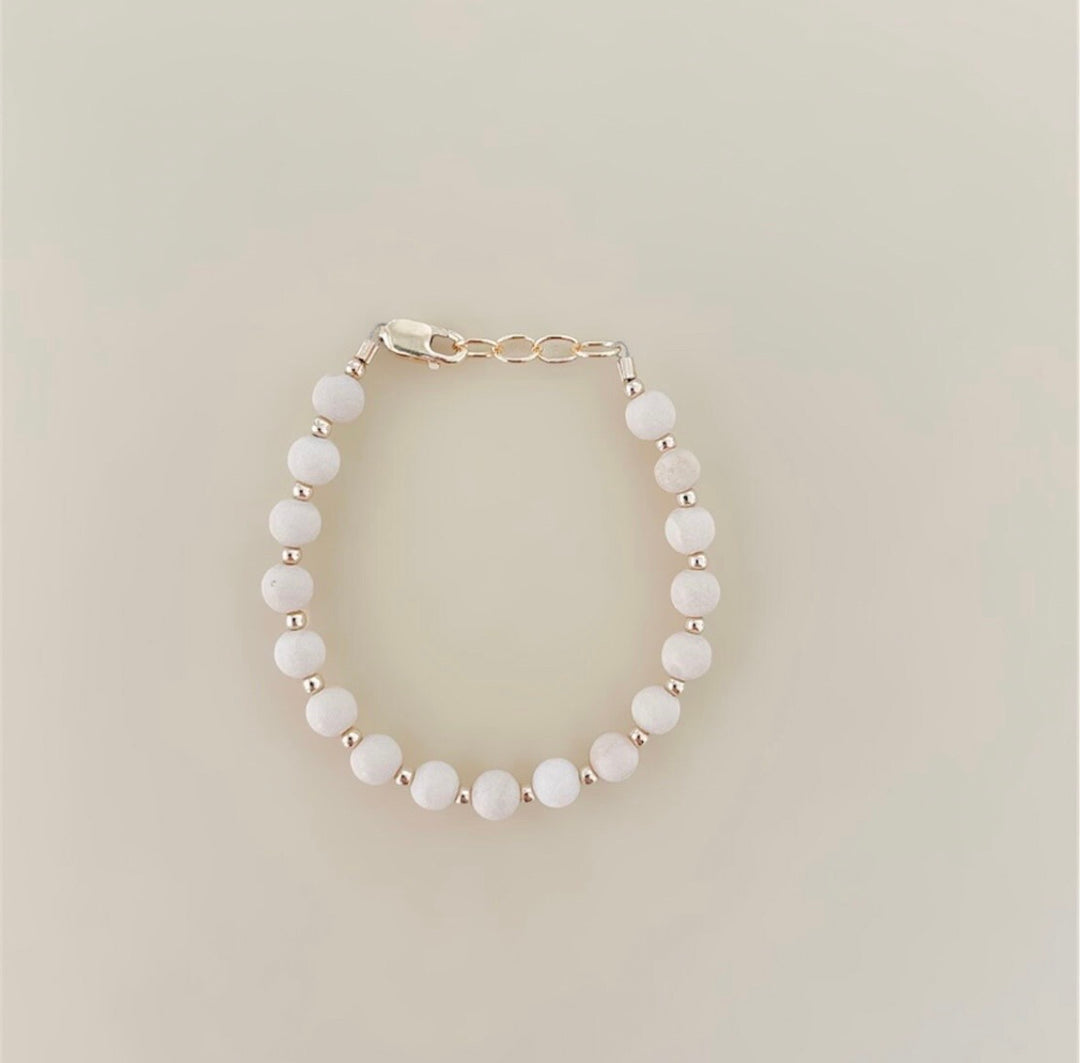 Tan &amp; gold layer bracelet