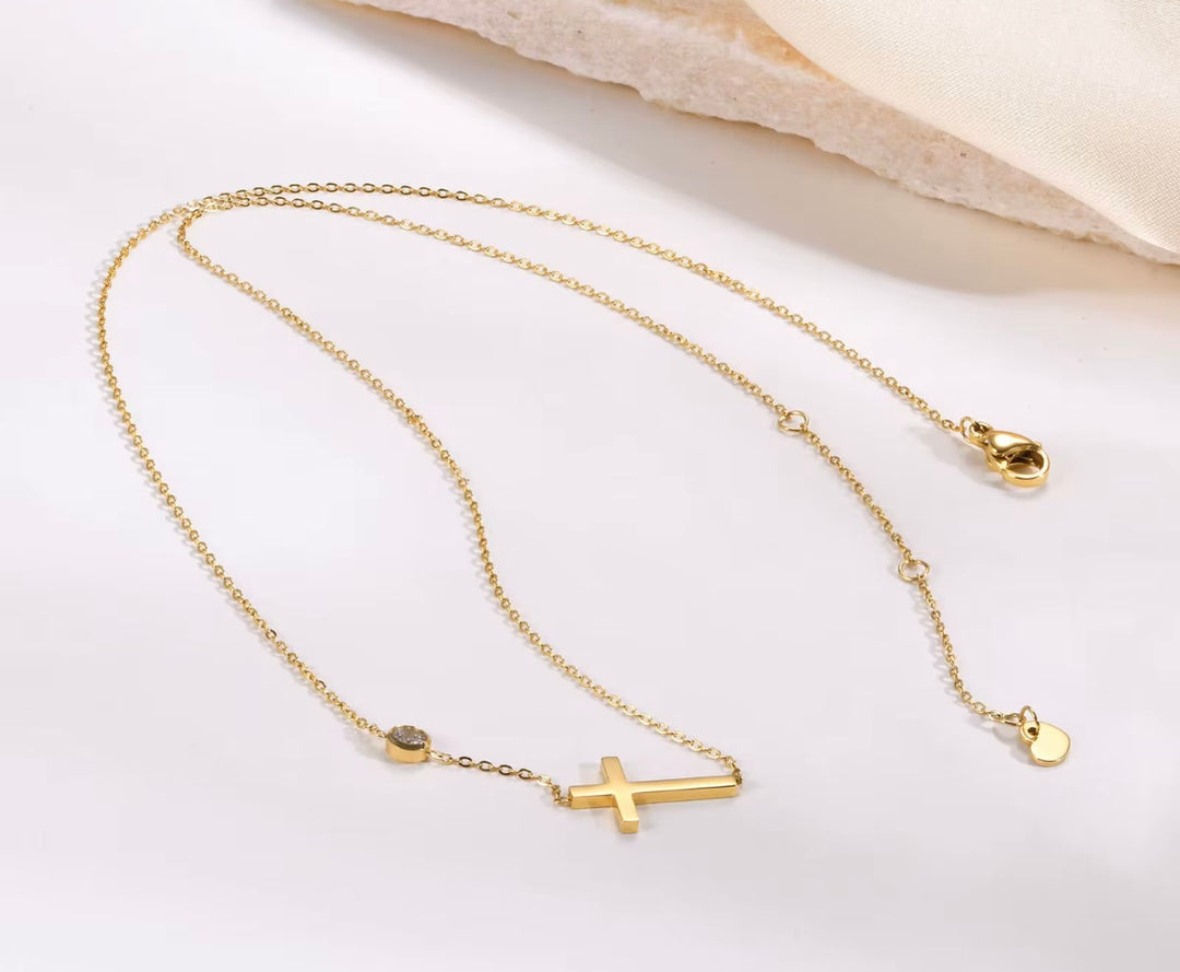 Women’s Gold cross necklace with diamond