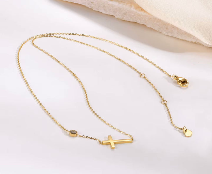 Women’s Gold cross necklace with diamond