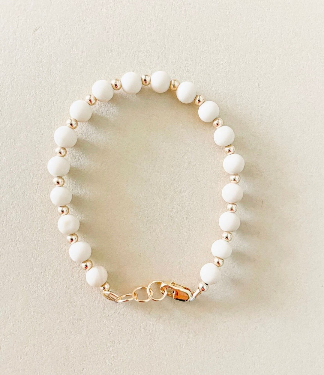 Tan &amp; gold layer bracelet