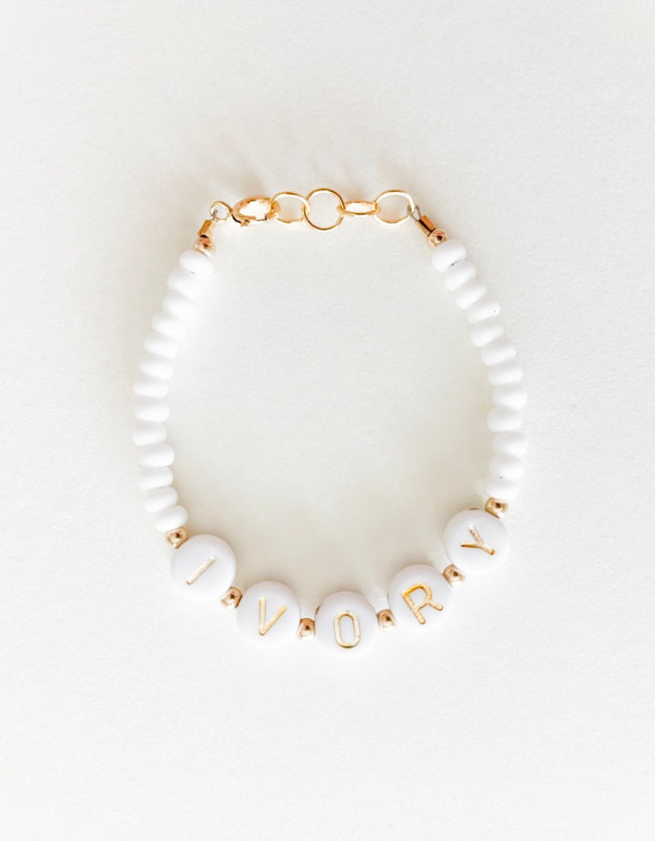 Gold & white custom name bracelet